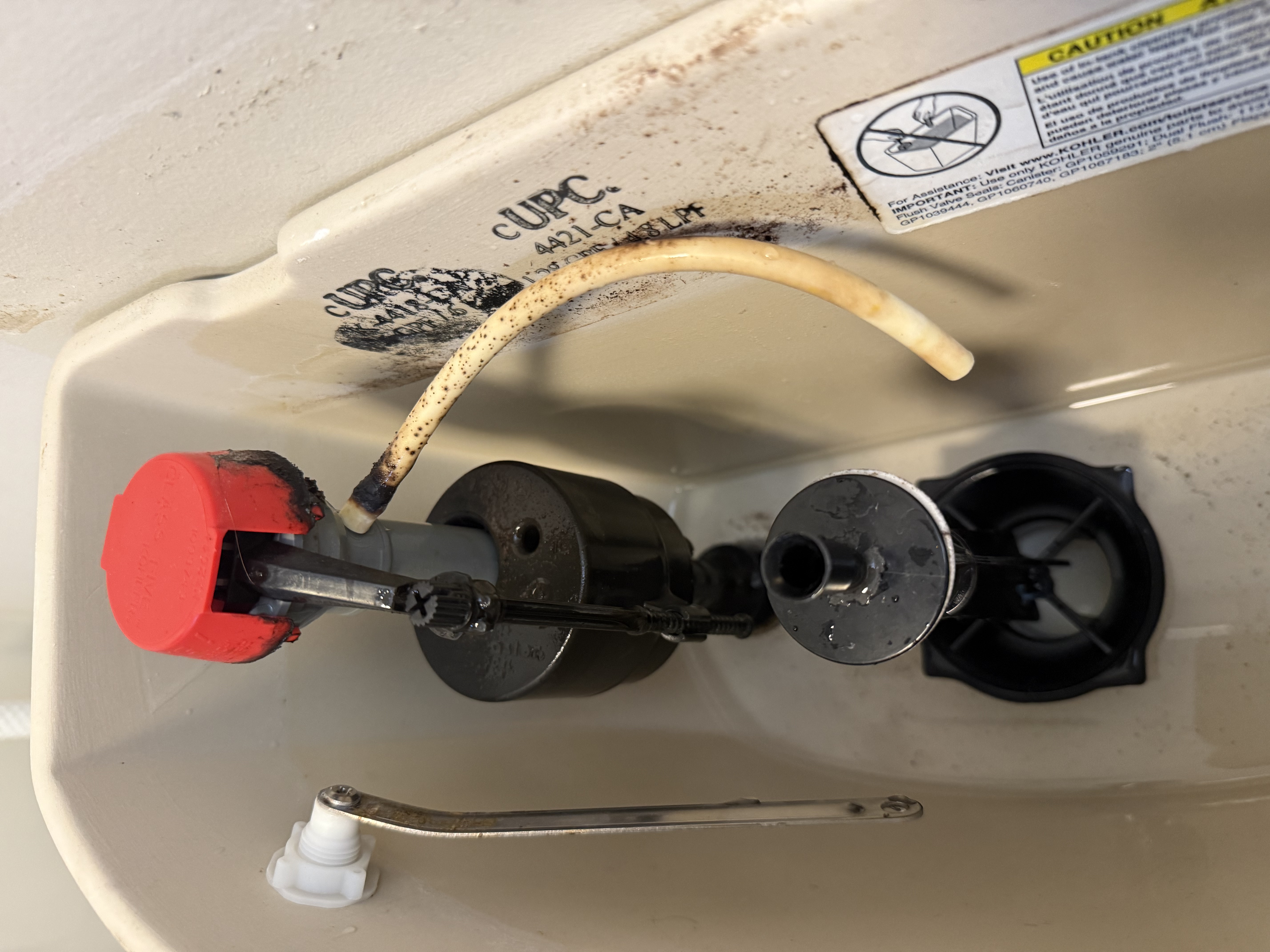 Toilet tank plumbing repair by North Shore Fixers Milwaukee
