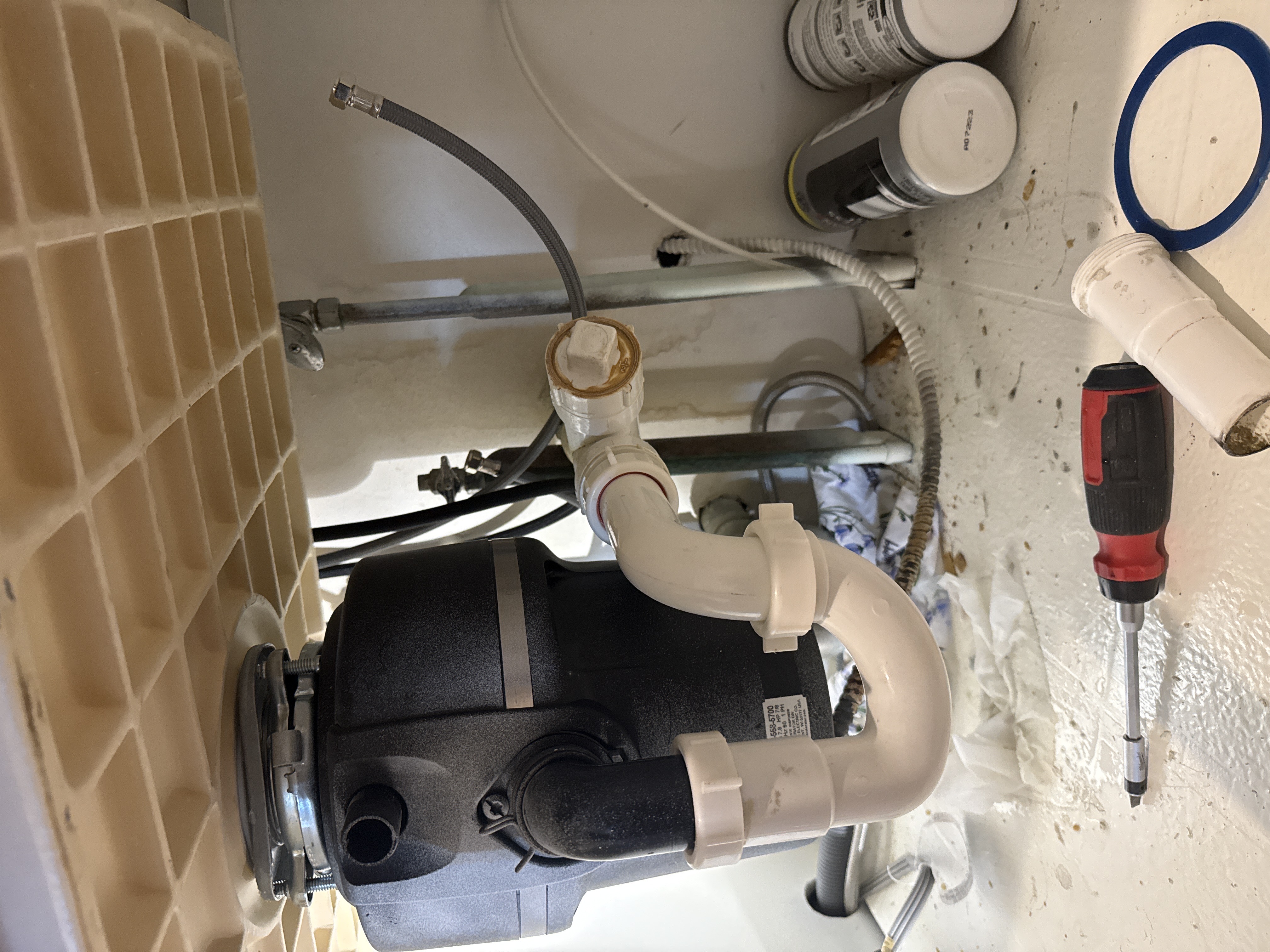 Under-sink garbage disposal installation by North Shore Fixers Milwaukee